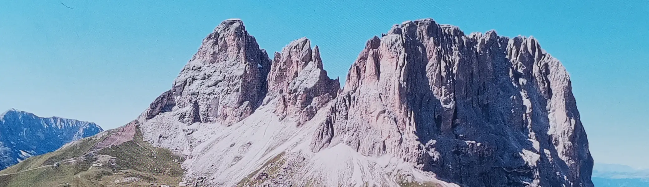 Blick vom Ersten Sellaturm auf das Langkofelmassiv. Grohmannspitze, Fünffingerspitze und Langkofel  | © Oliver Knorre